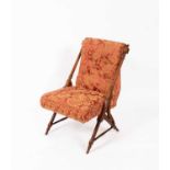 An Aesthetic Movement mahogany nursing chair