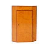 A craftsman made small corner cabinet