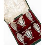 A silver cruet set