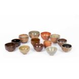 Thirteen assorted studio pottery tea bowls and bowls