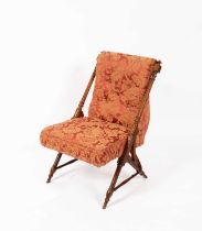 An Aesthetic Movement mahogany nursing chair