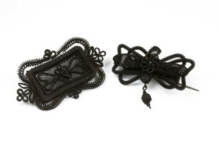 Two Berlin wirework brooches