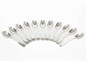 A set of eleven Victorian fiddle pattern silver dessert spoons