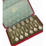 A set of twelve silver coffee spoons