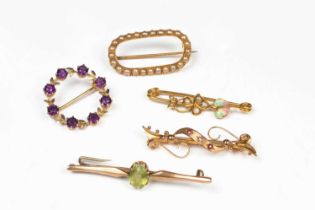 Five Edwardian and later gem set brooches