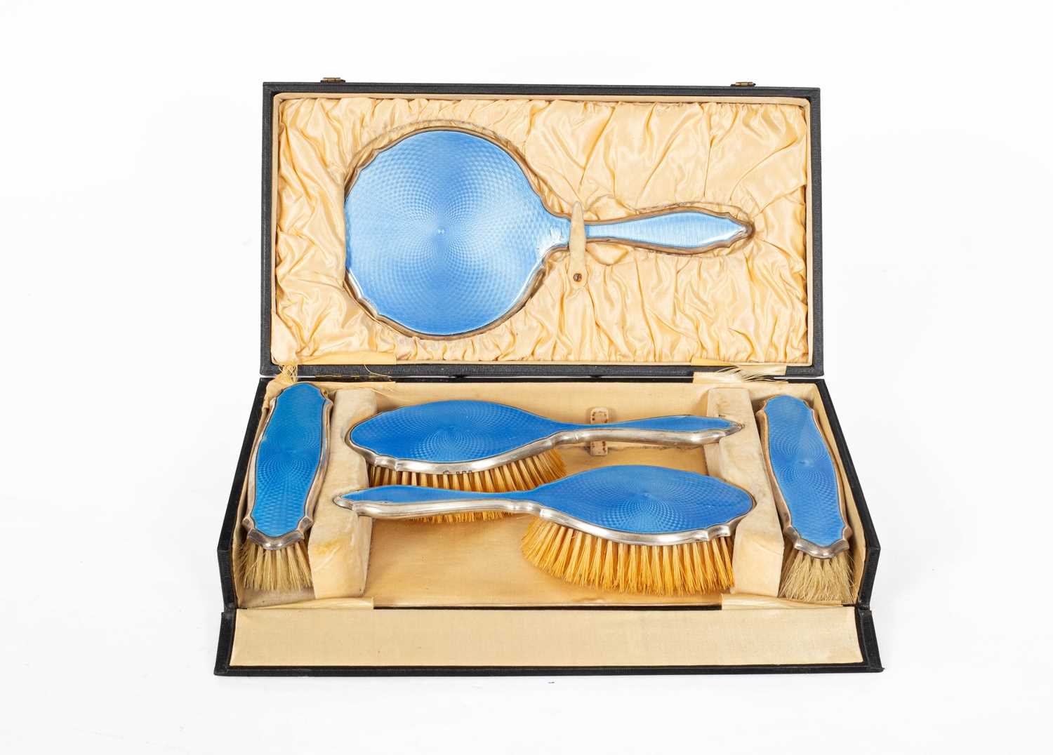 A silver and blue enamel dressing set