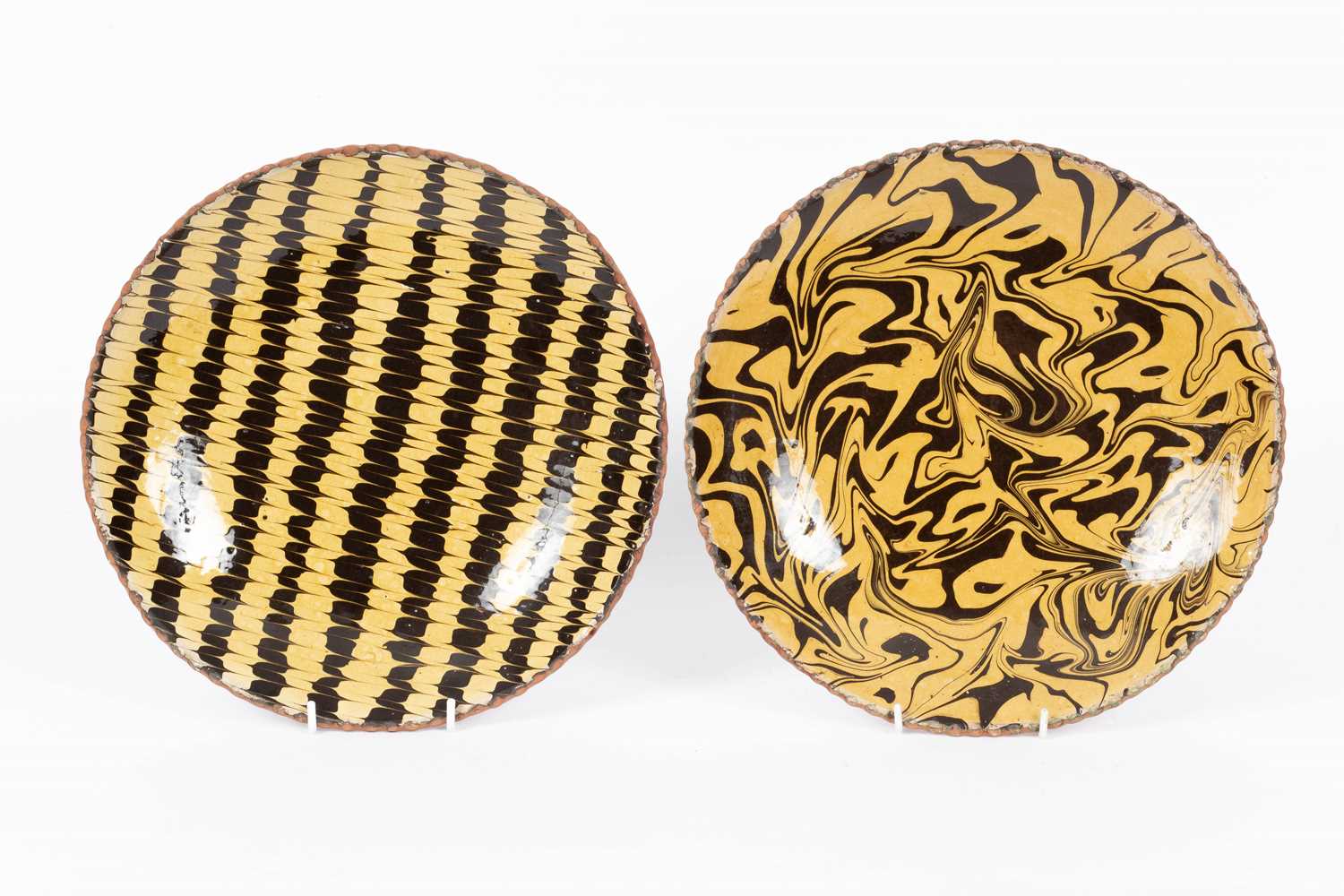 Two marbled slipware dishes