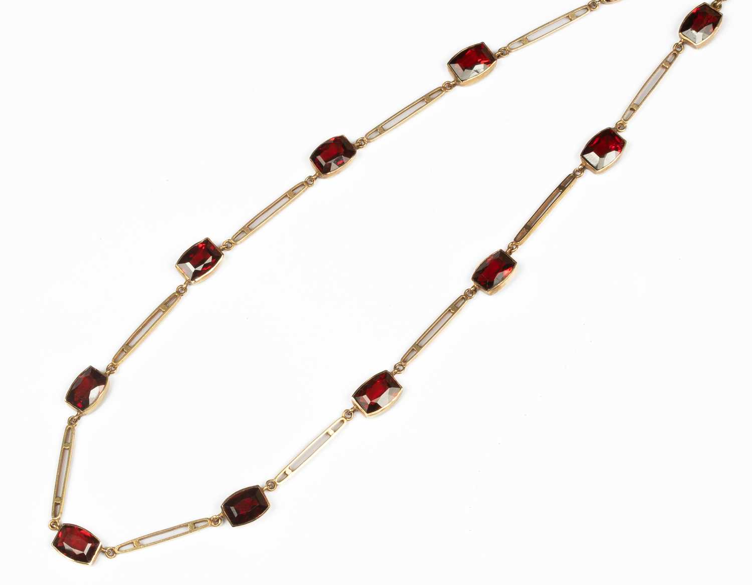 A garnet and 9ct gold necklace