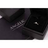 An 18K white gold diamond solitaire ring