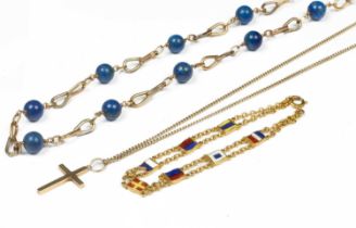 A 9ct gold chain link necklace set with lapis lazuli beads