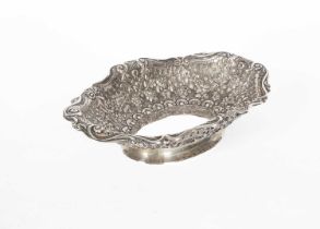 An oval silver dish