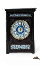 Lewis Foreman Day (1845-1910) An Arts and Crafts porcelain mounted ebonised mantel clock