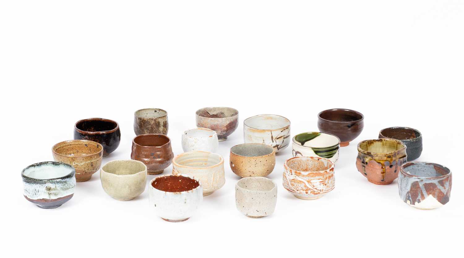 Nineteen various studio pottery bowls and tea bowls