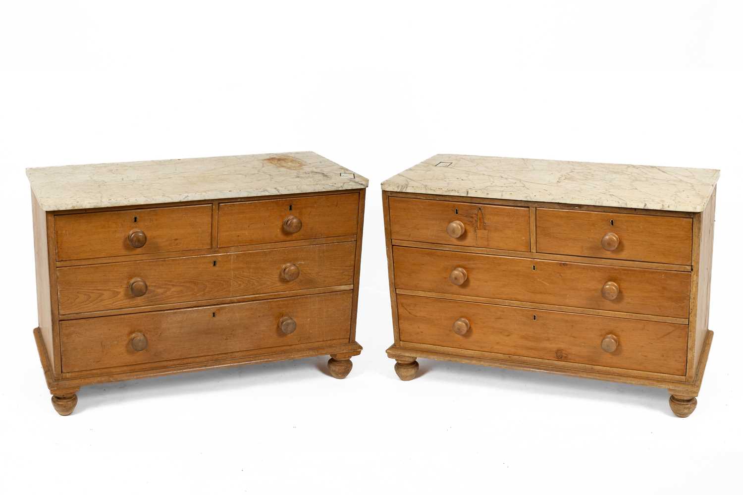 A pair of Victorian pine marble top chests