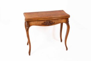 A Victorian beech and burr walnut veneered fold out card table