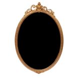 A 19th Century oval gilt wall mirror