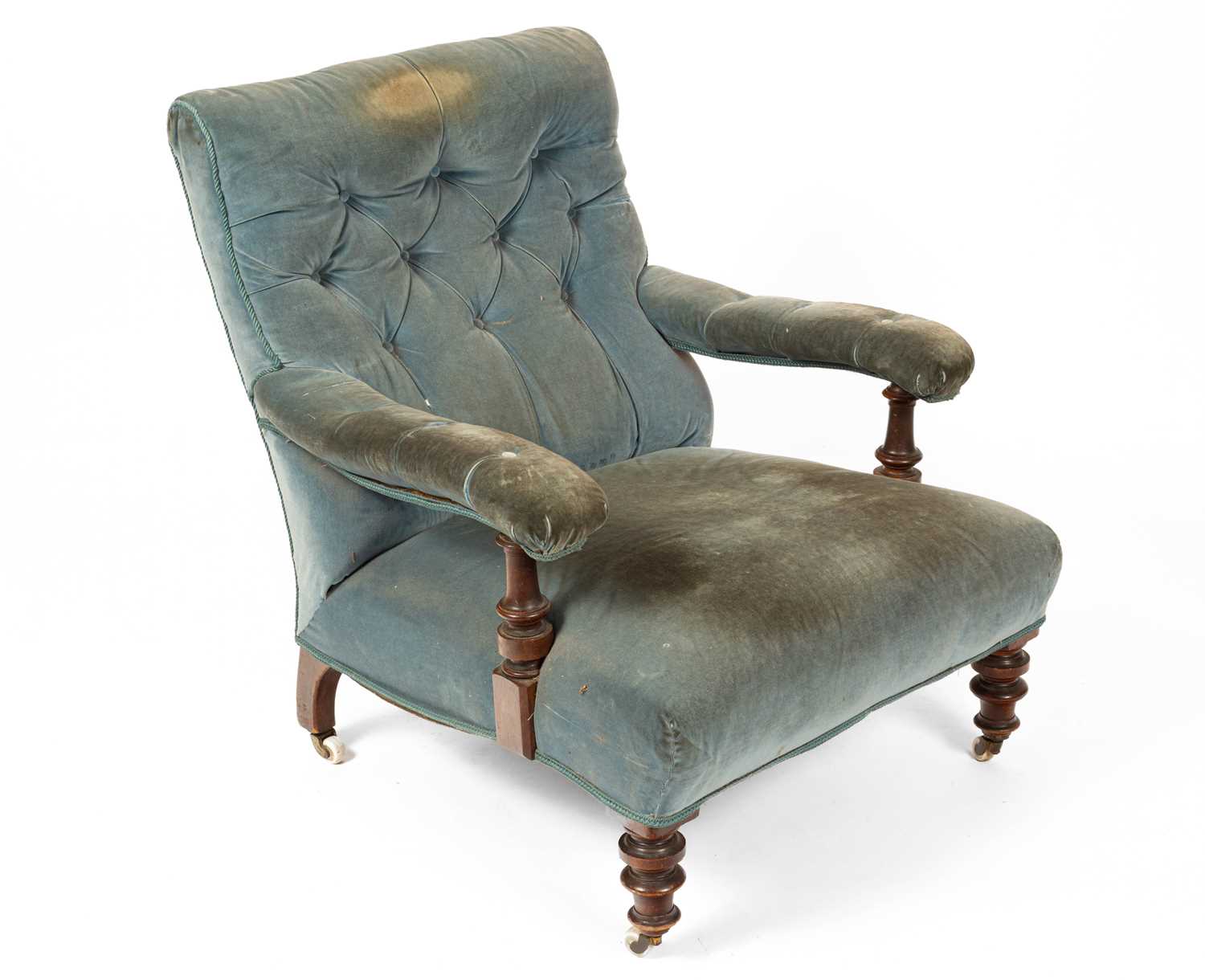 A Victorian upholstered open armchair