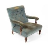 A Victorian upholstered open armchair