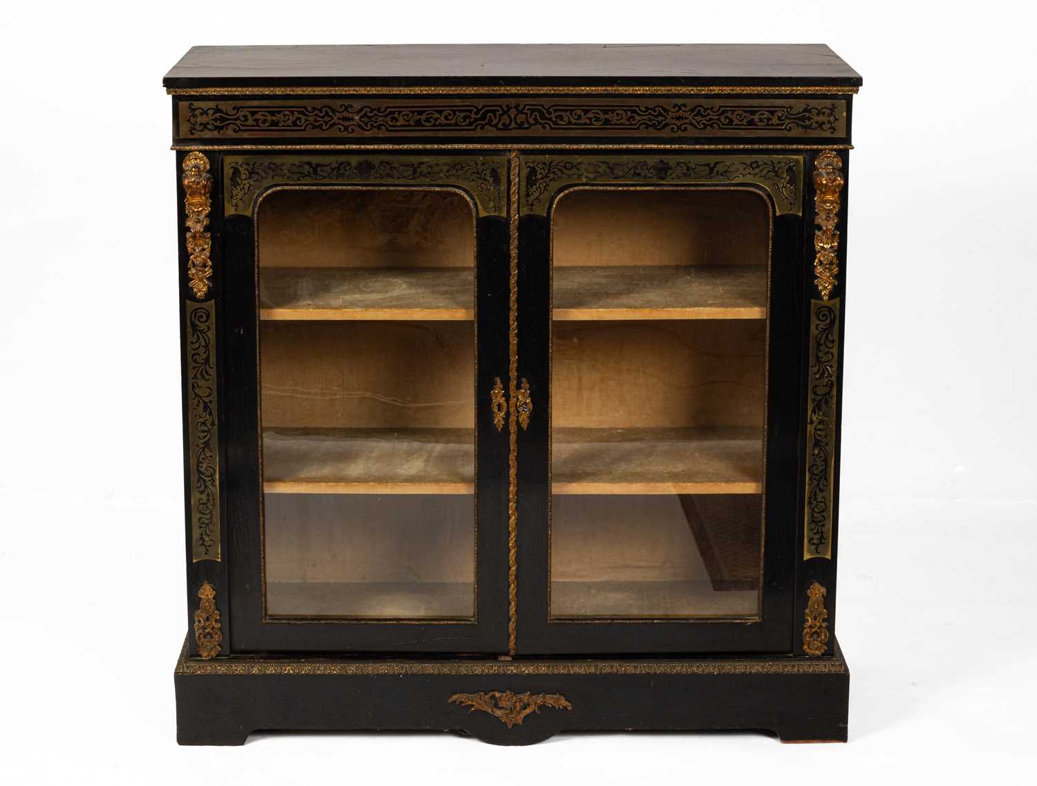 A Victorian ebonised and contrepartie brass inlaid and brass mounted display cabinet