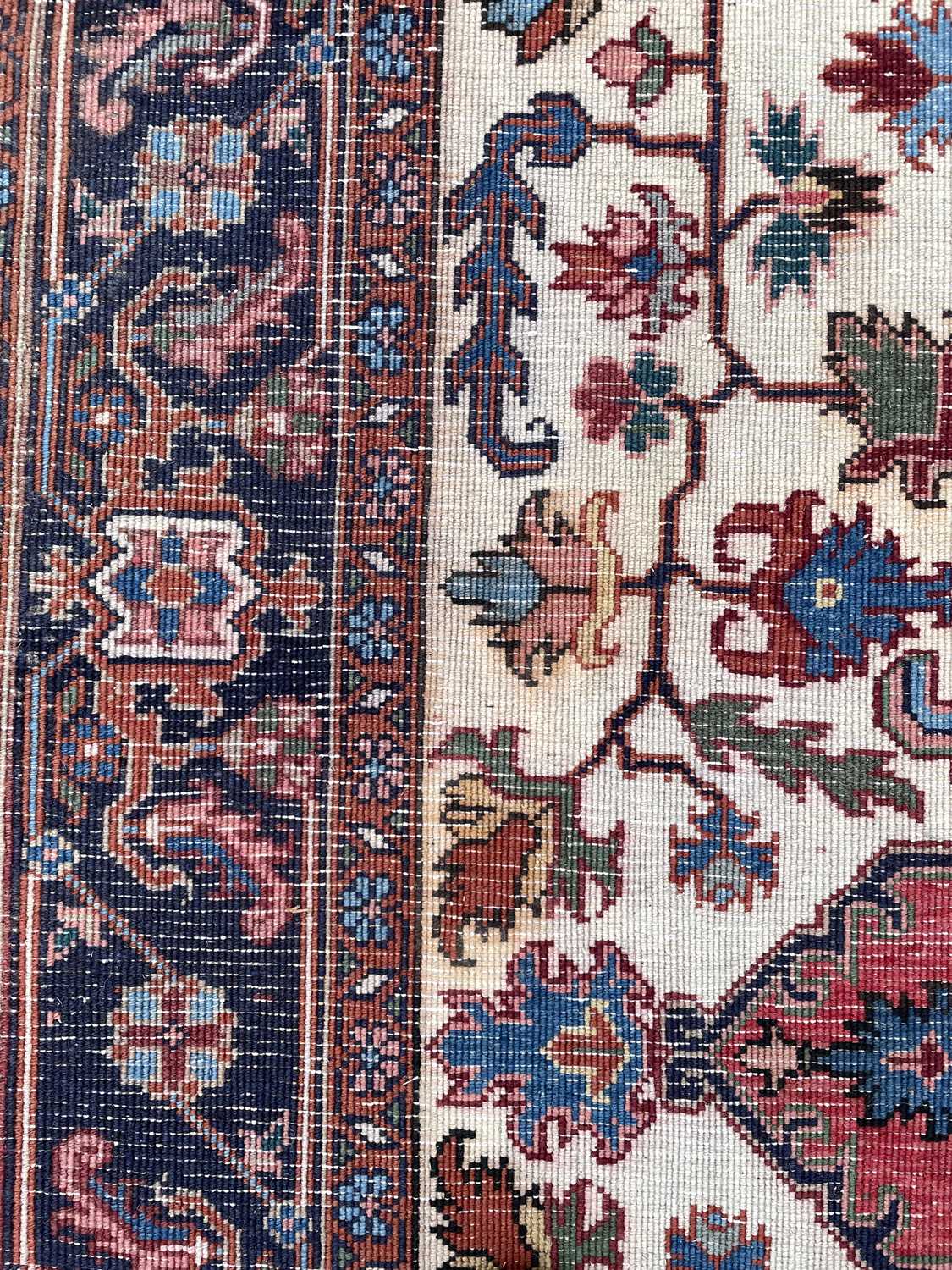A Heriz rug - Image 11 of 17