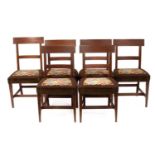 A set of six Regency style mahogany dining chairs