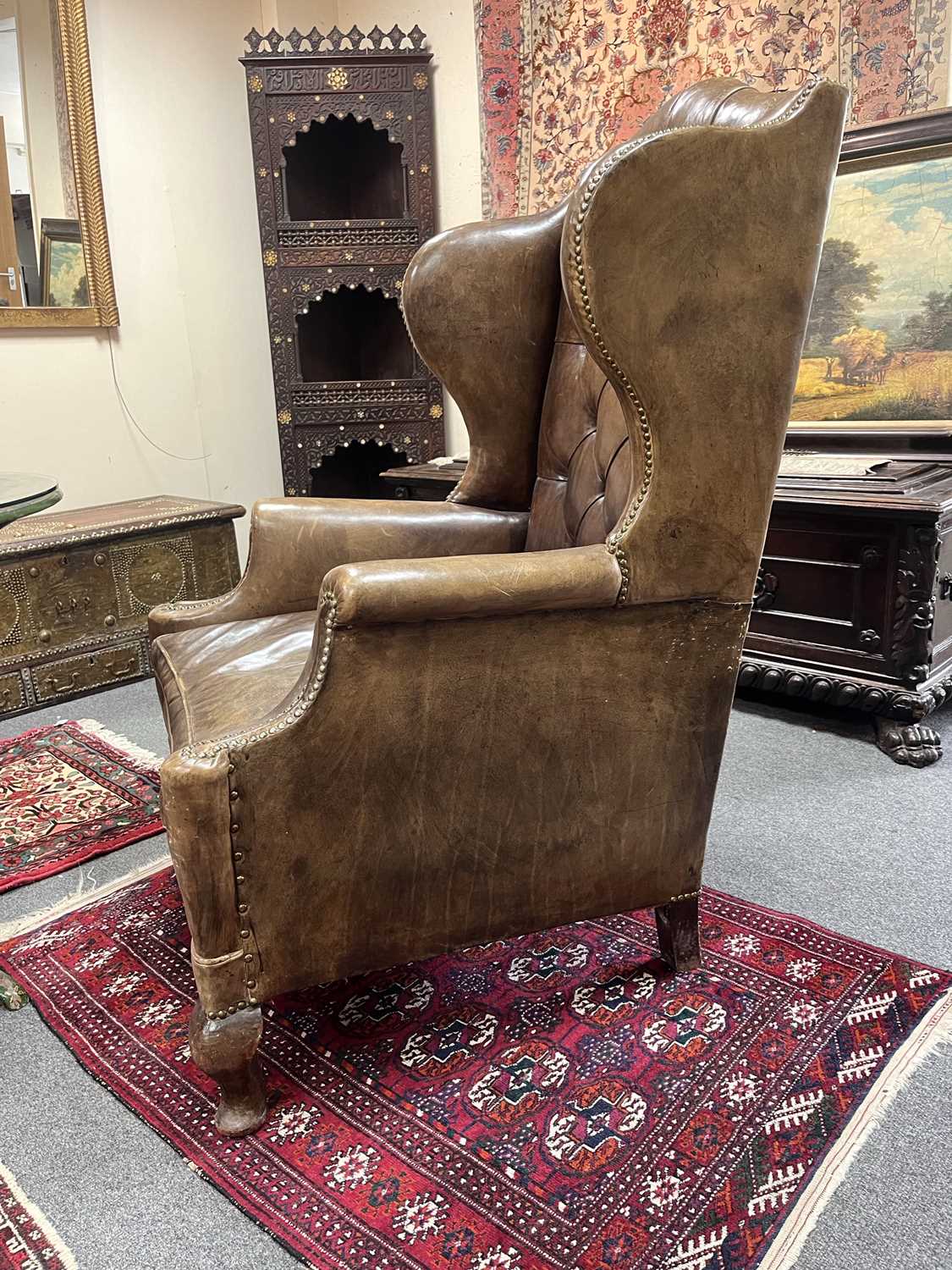 An early 20th Century leather wingback chair - Image 8 of 17