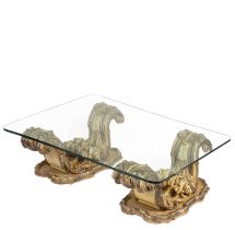 A Baroque inspired glass top coffee table