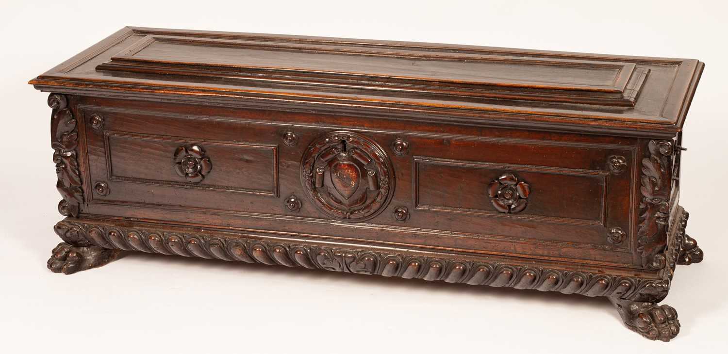 A 17th Century Italian walnut carved and panelled cassone