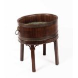 A George III style mahogany wine cooler