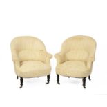 A pair of Victorian tub armchairs