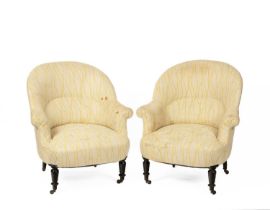 A pair of Victorian tub armchairs