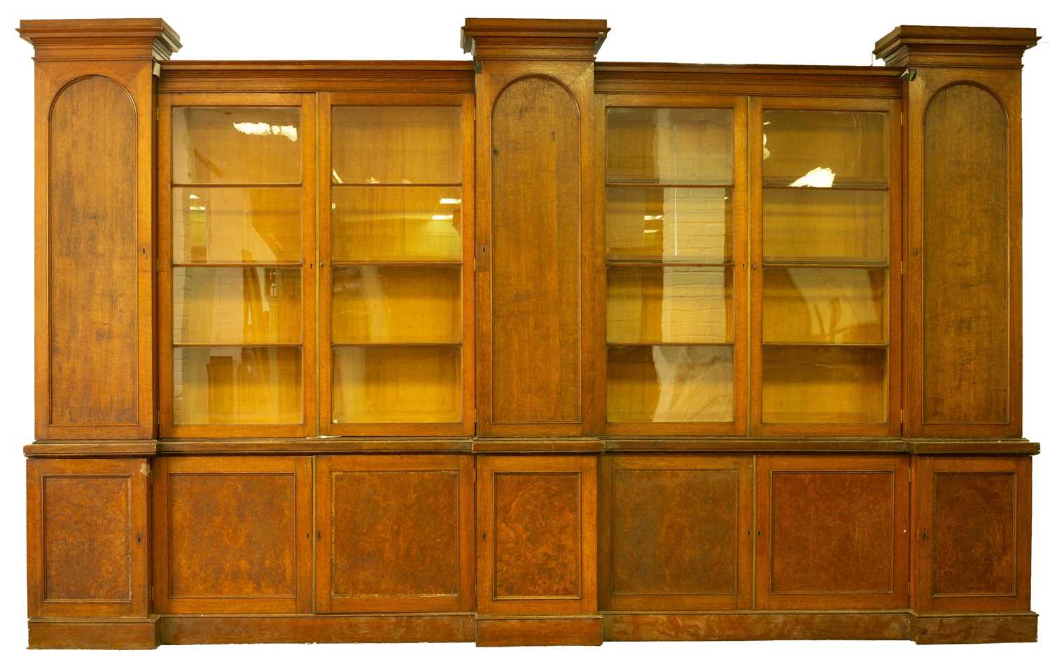 A large 19th century oak breakfront library bookcase