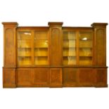 A large 19th century oak breakfront library bookcase