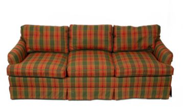 An upholstered three-seater sofa