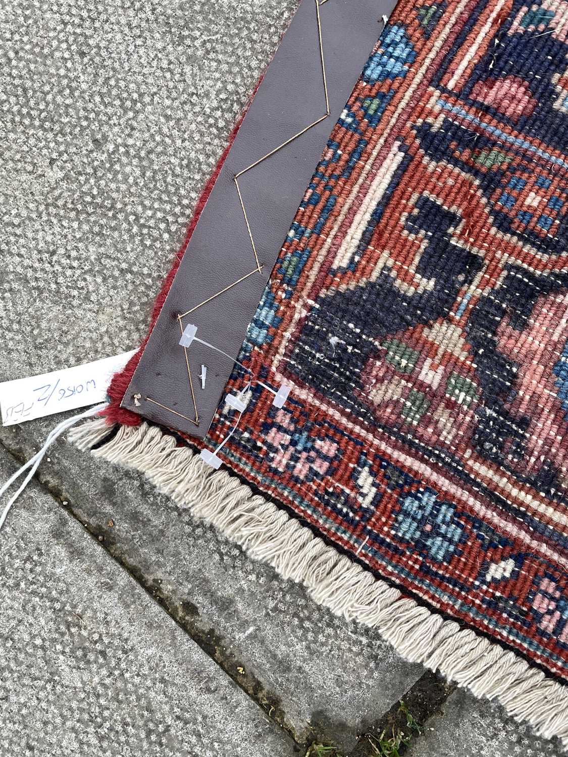 A Heriz rug - Image 17 of 17