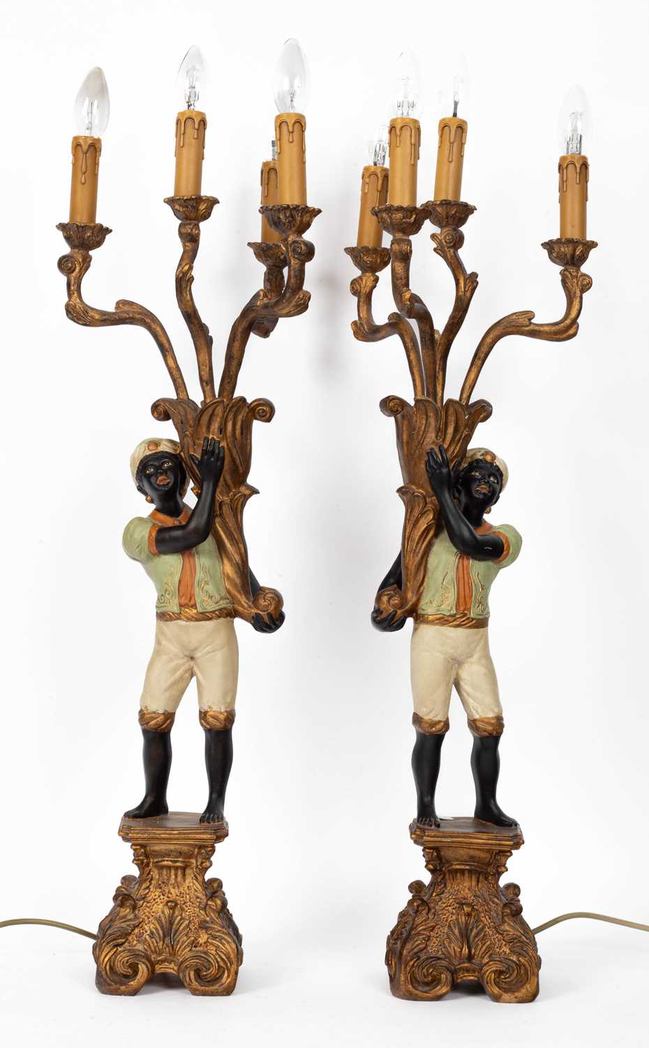 A pair of 20th Century four-branch table candelabra