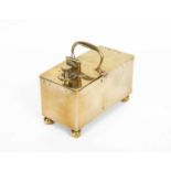 A mid 19th Century brass ‘honesty’ tobacco box