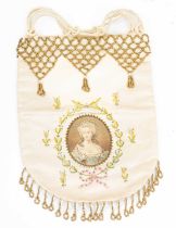 A cream silk embroidered bag