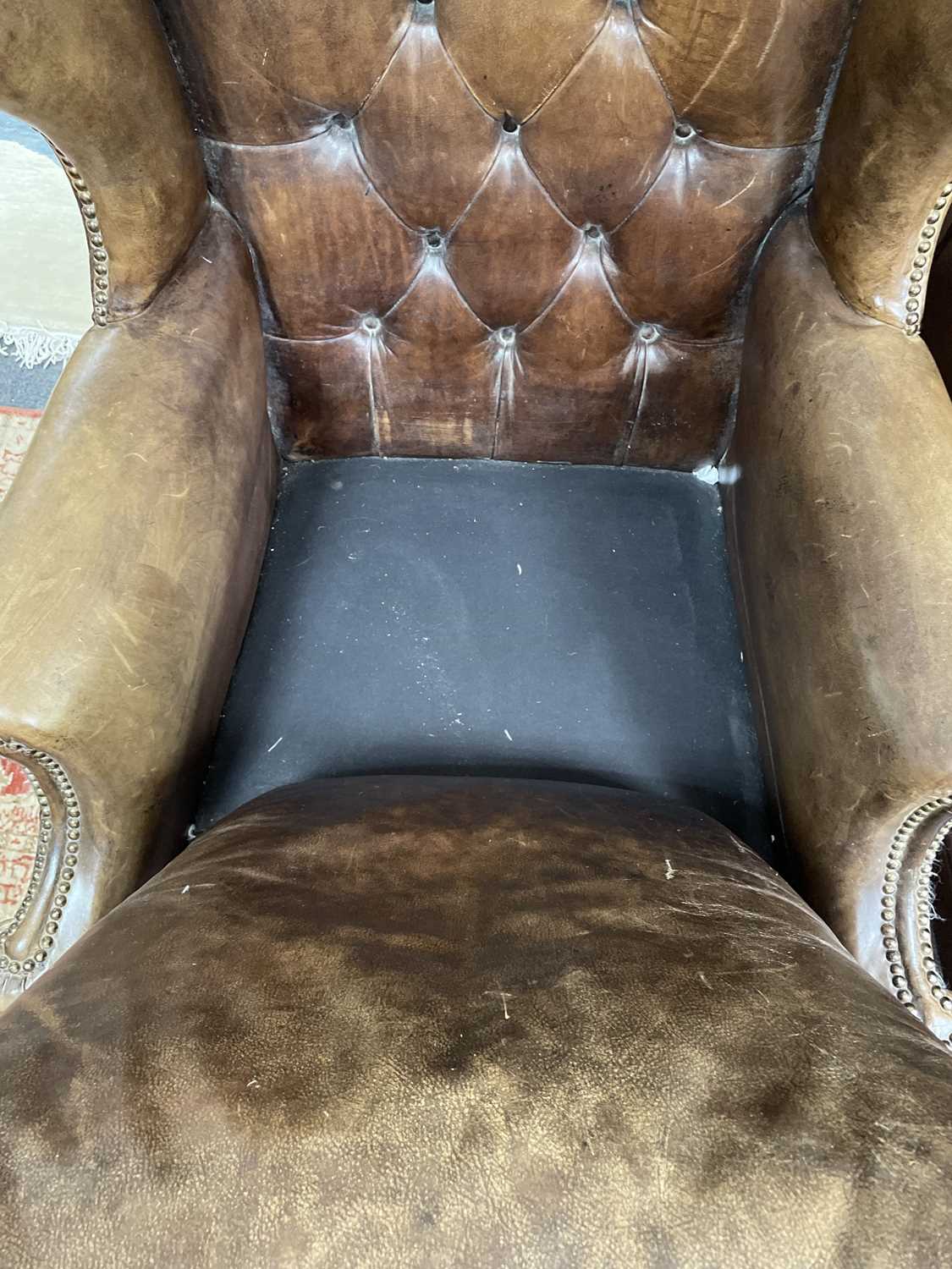 An early 20th Century leather wingback chair - Image 14 of 17