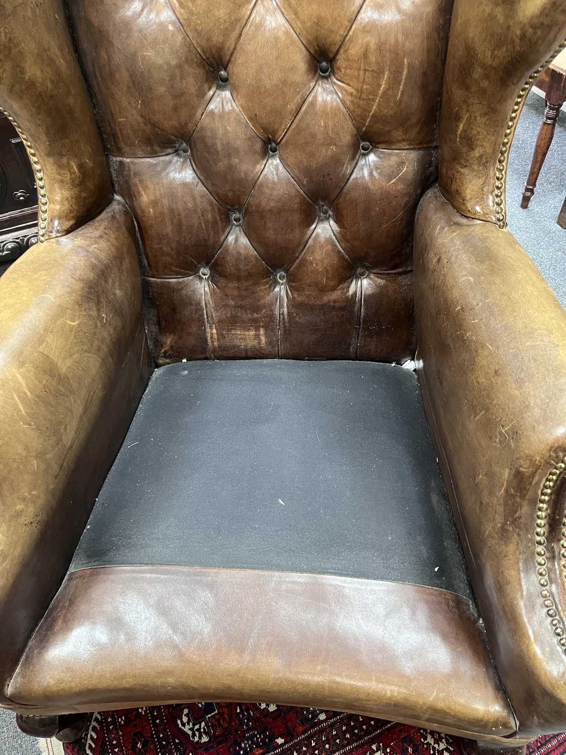 An early 20th Century leather wingback chair - Image 3 of 17