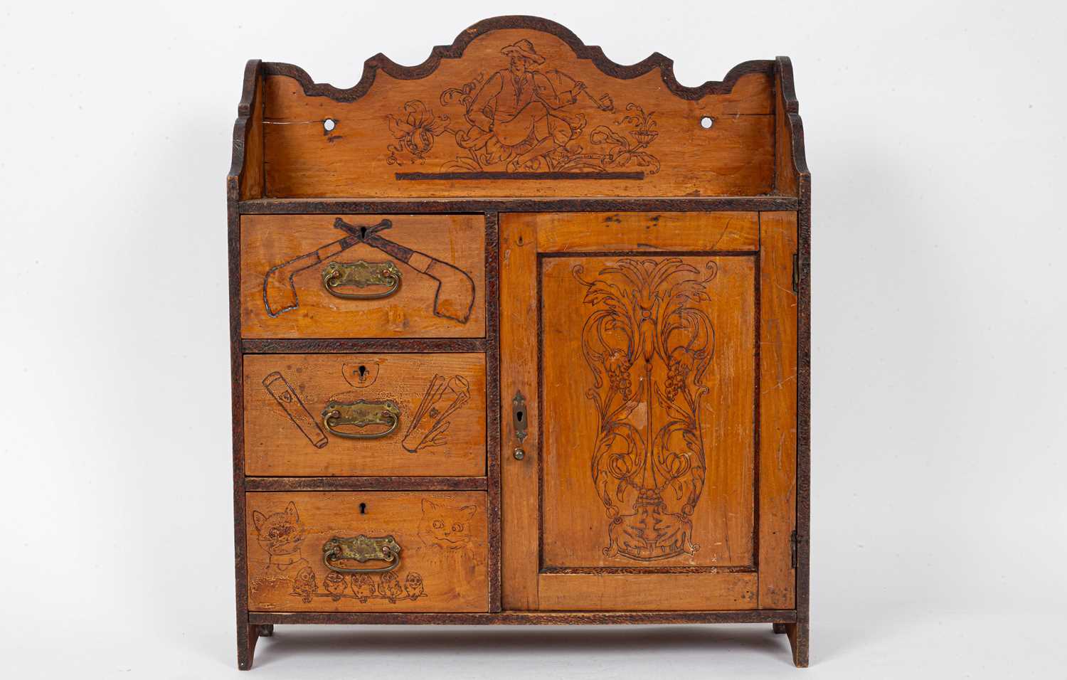 An early 20th Century smoking cabinet