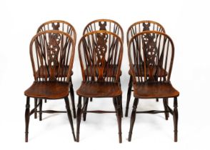 A set of six Windsor wheel back dining chairs