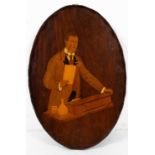 A George III style mahogany tray inlaid with a portrait of Joseph Chamberlain