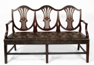 A George III style mahogany triple chair back settee