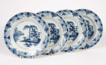 Four English delftware blue and white plates