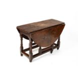 An 18th Century oak gateleg table