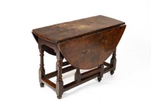 An 18th Century oak gateleg table