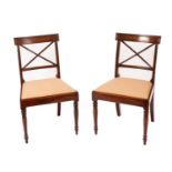 A pair of Regency mahogany dining chairs