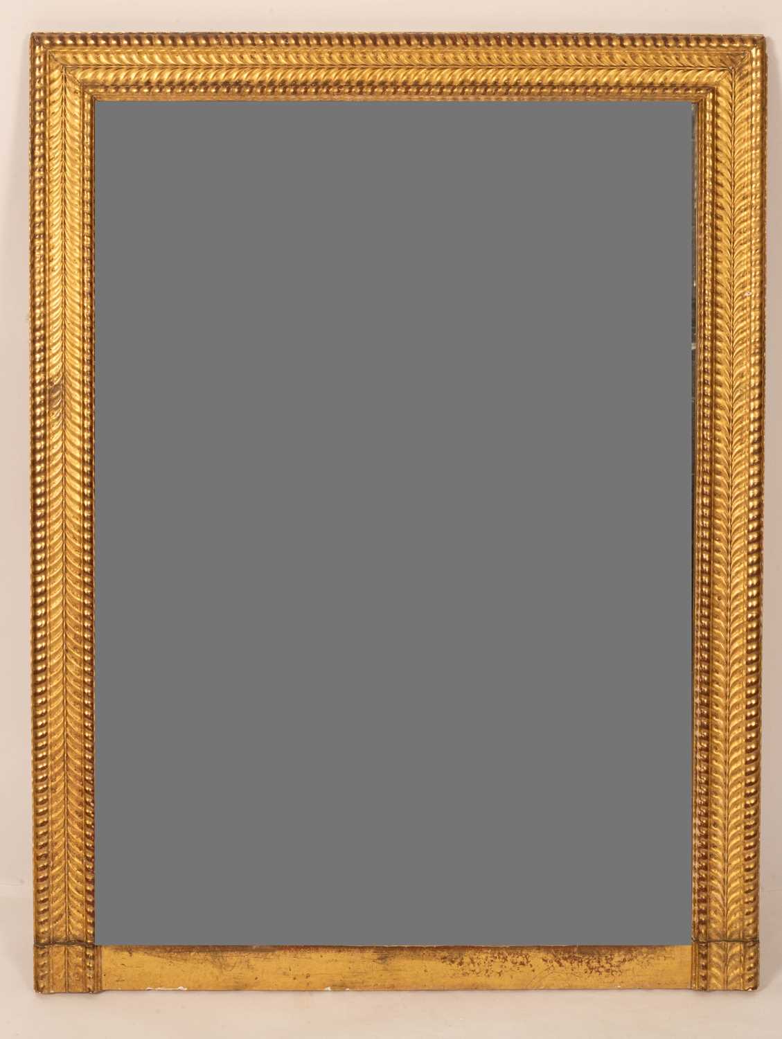 A gilt and gesso wall mirror