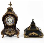 A gilt metal mounted ebonised case mantle clock